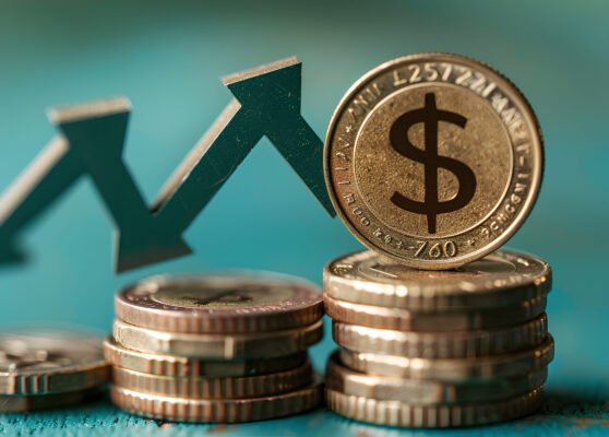 moedas-em-pilha-com-seta-para-cima-e-simbolo-de-porcentagem